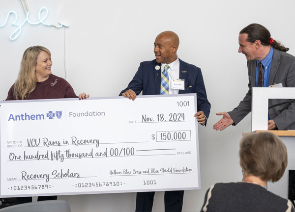 Photo of check presentation for Rams in Recovery